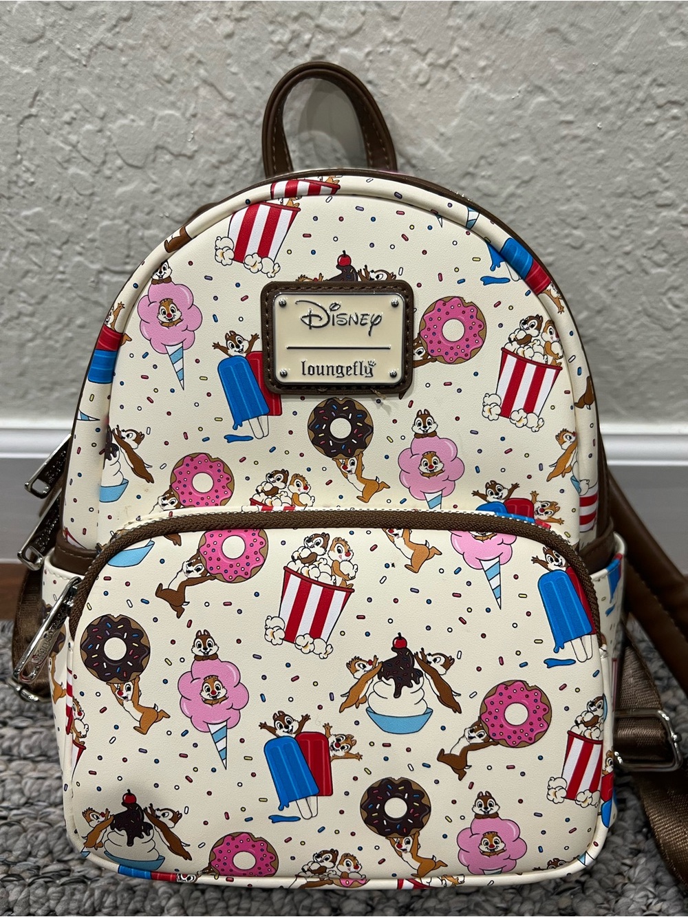 Loungefly Cream Mini Backpack with Pink & Blue Carnival Print